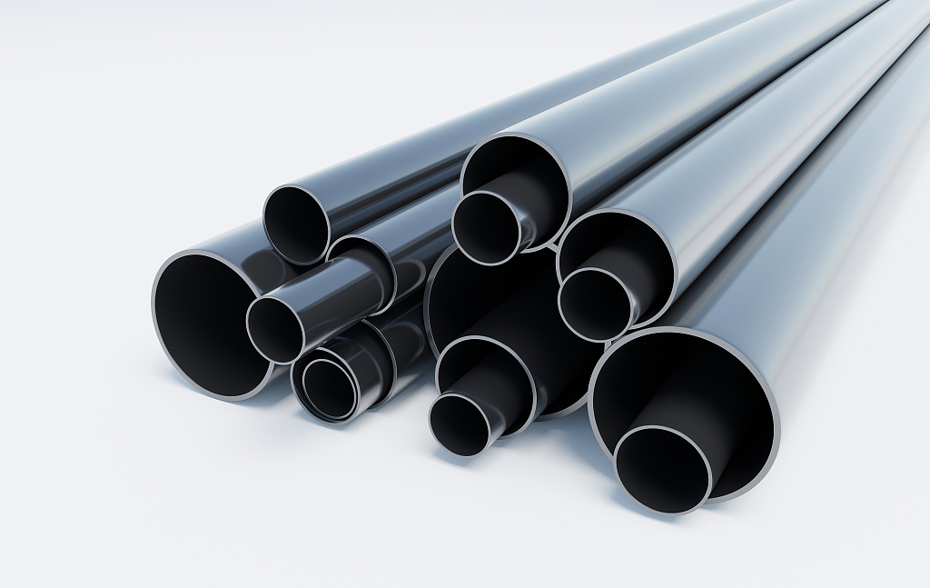 Metal pipes of different diameters isolated on white background.